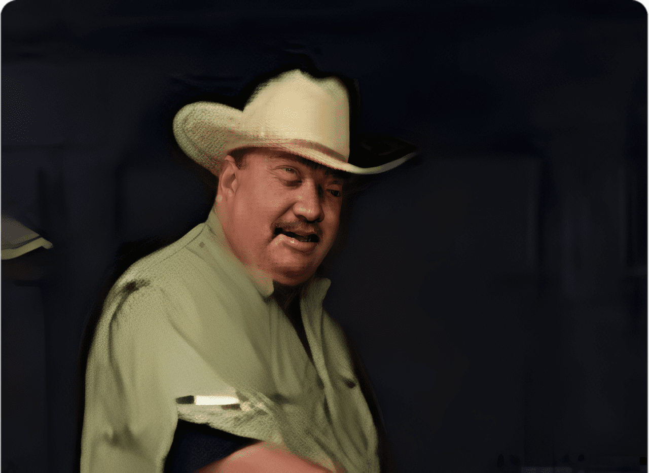Cowboy hat man in green shirt
