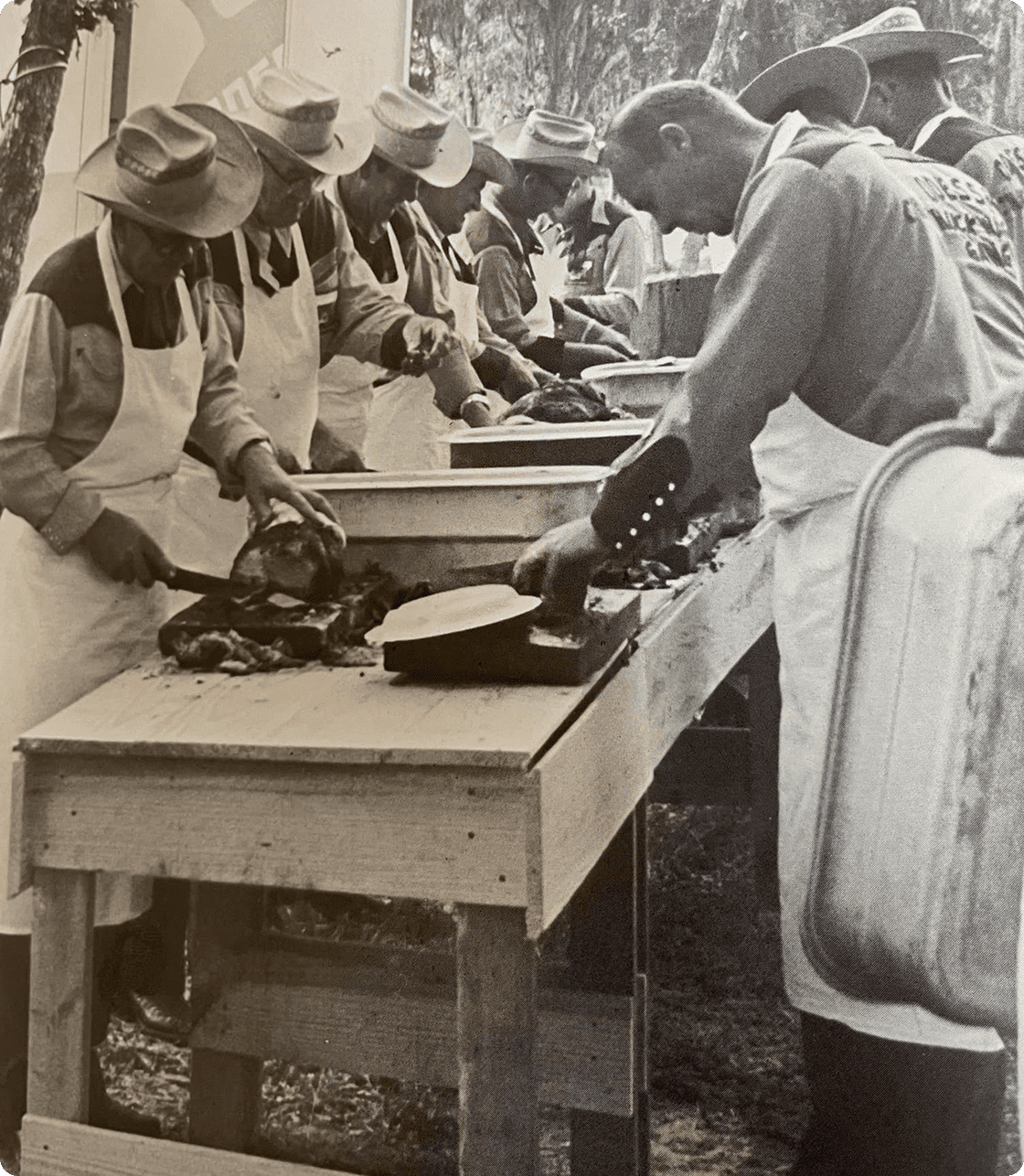 Group preparing food outdoors