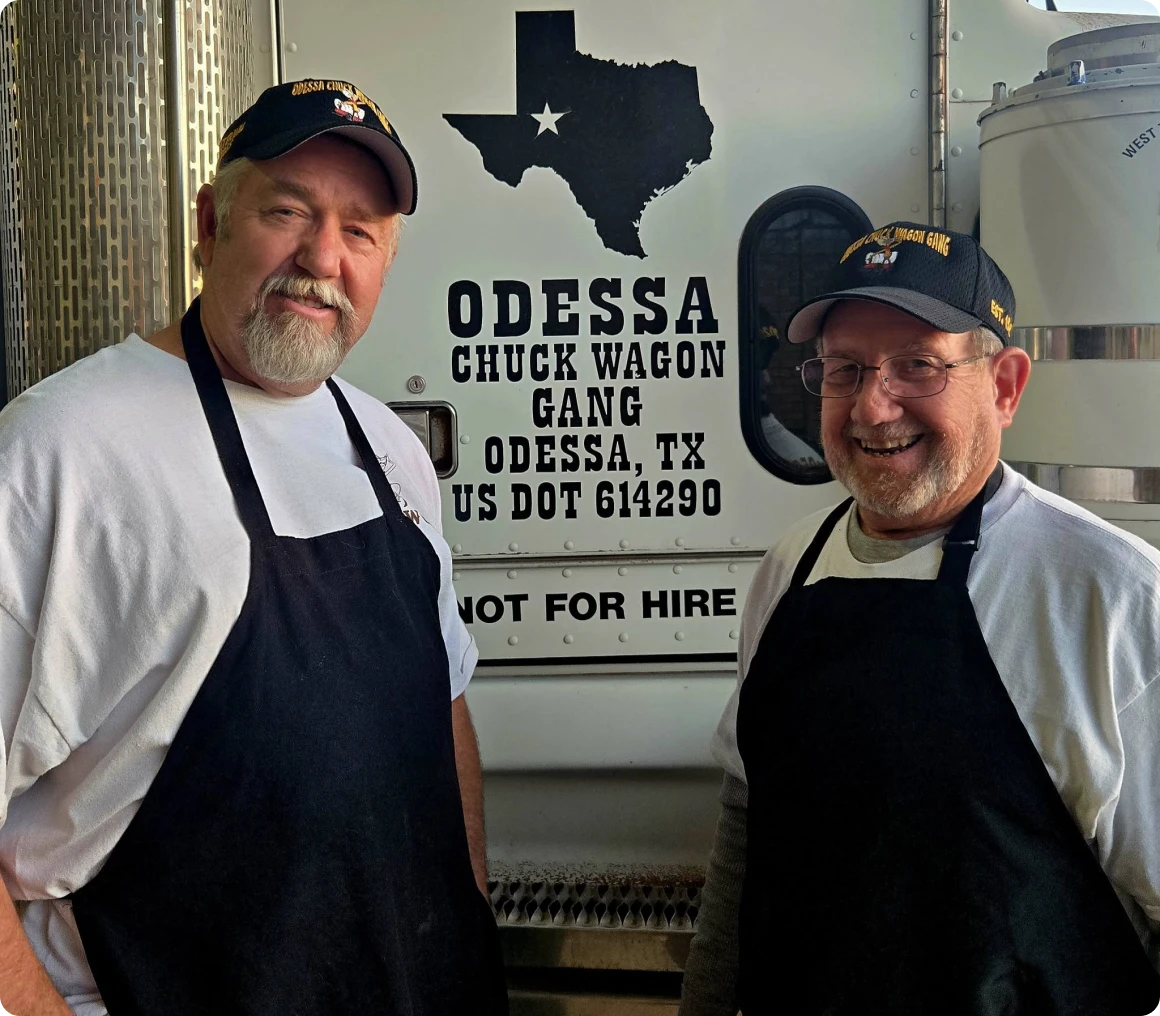 Men standing by Odessa food truck