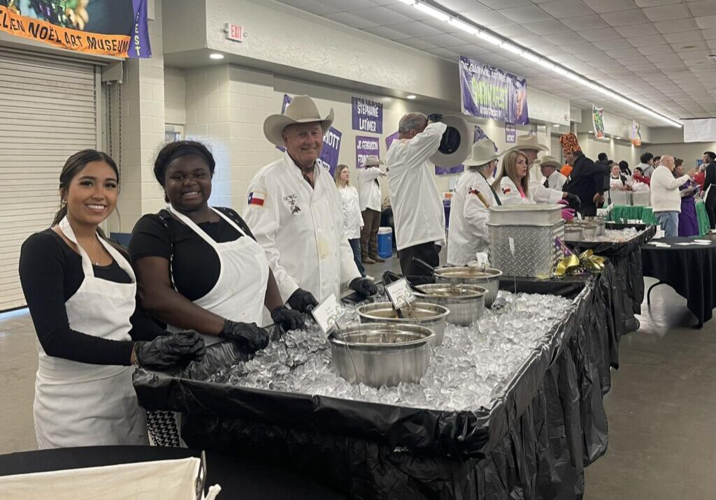 Culinary team preparing dishes for guests
